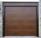Puerta seccional ISO 45 imitación madera oscuro