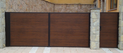 Puerta batiente dos hojas forrada panel ISO 45 imit. madera oscuro